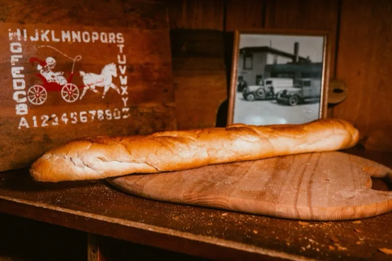Long Italian loaf on a cutting board